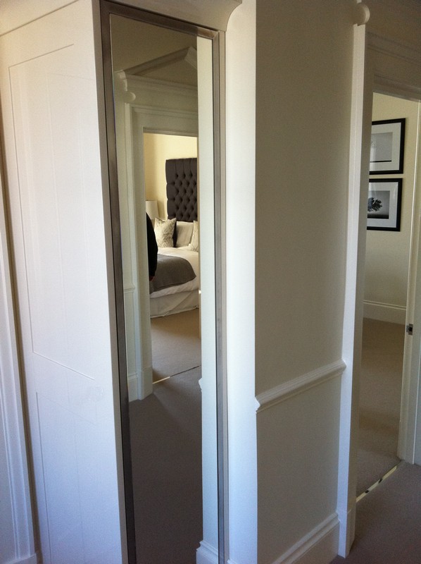 Full-length wardrobe mirror fitted in Brixton home