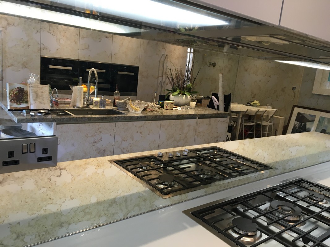 Mirror glass splashback in Brixton luxury kitchen